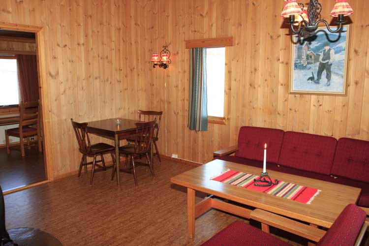 Stue med spisekrok i familiehytte p&aring; Dissen Seter Hytteutleie - H&oslash;vringen - Rondane